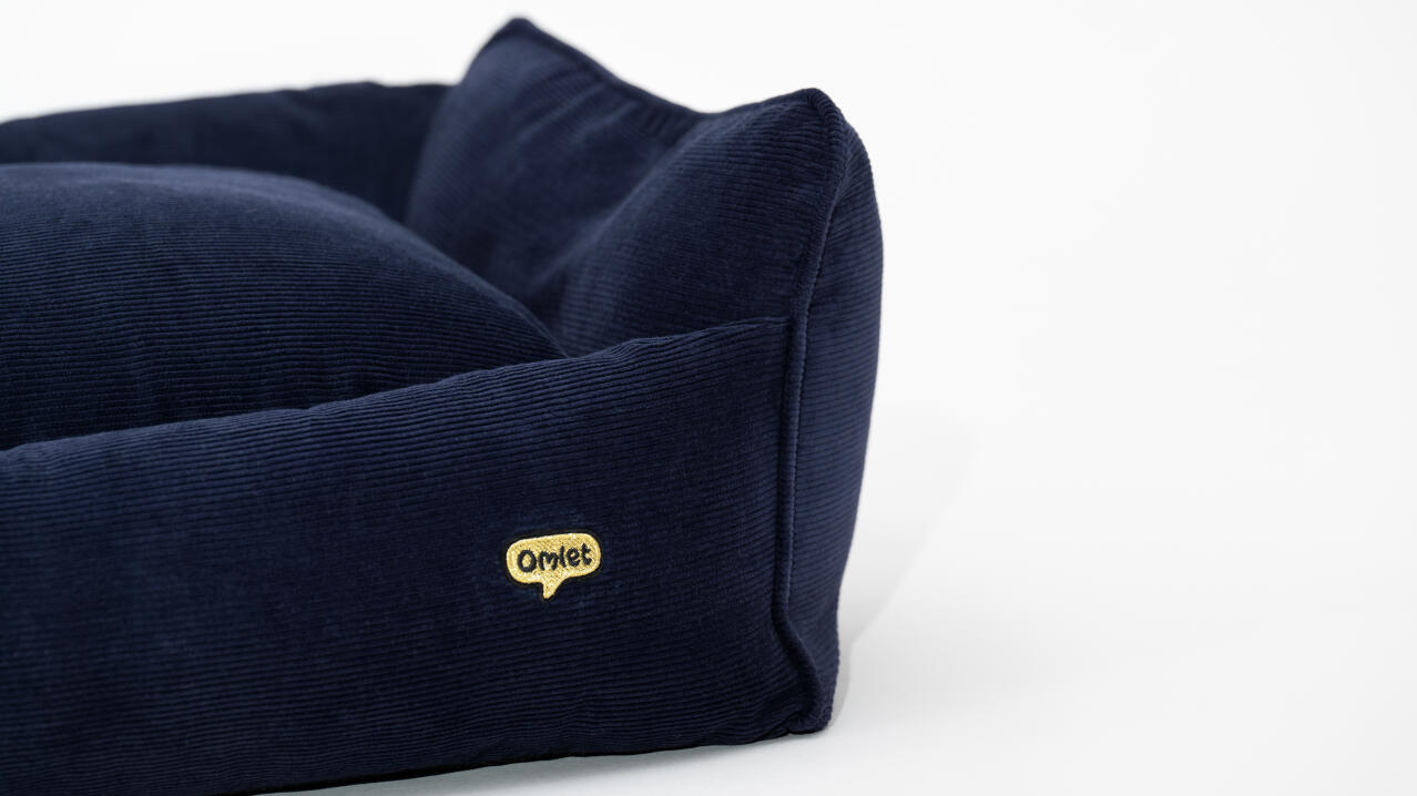 detail of super soft luxurious navy cord nest bed