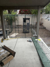 The catio tunnel attached to a catio enclosure.