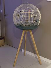 The blue and cream Geo bird cage with stand.