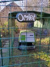 The green Eglu Cube set up in the Walk In chicken run.