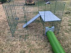 A tunnel connected to an outdoor enclosure