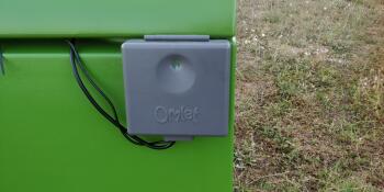 Close up of Omlet Automatic Chicken Coop Door Sensor