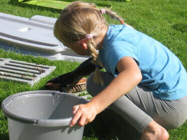 Rebecca washing the cube inserts