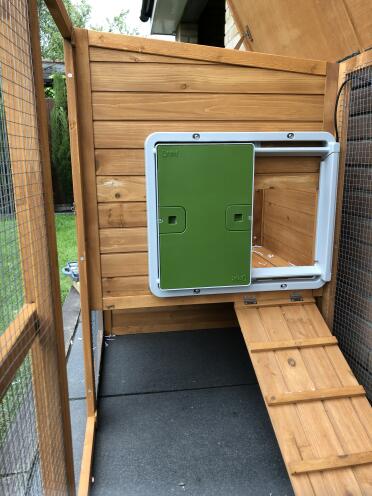 Auto door on wooden hut