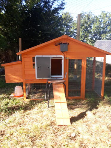 Omlet Grey Automatic Chicken Coop Door Attached to Wooden Chicken Coop