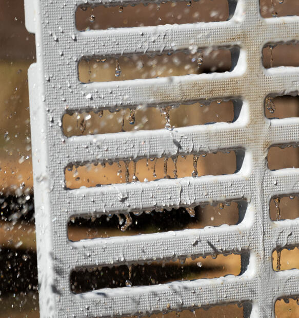 close up of the easy to clean eglu pro chicken coop roosting bars